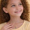 Children's Venetian necklace with a watermelon pendant studded with red and green cubic zirconia, 18k gold plated, and for hygienic purposes.